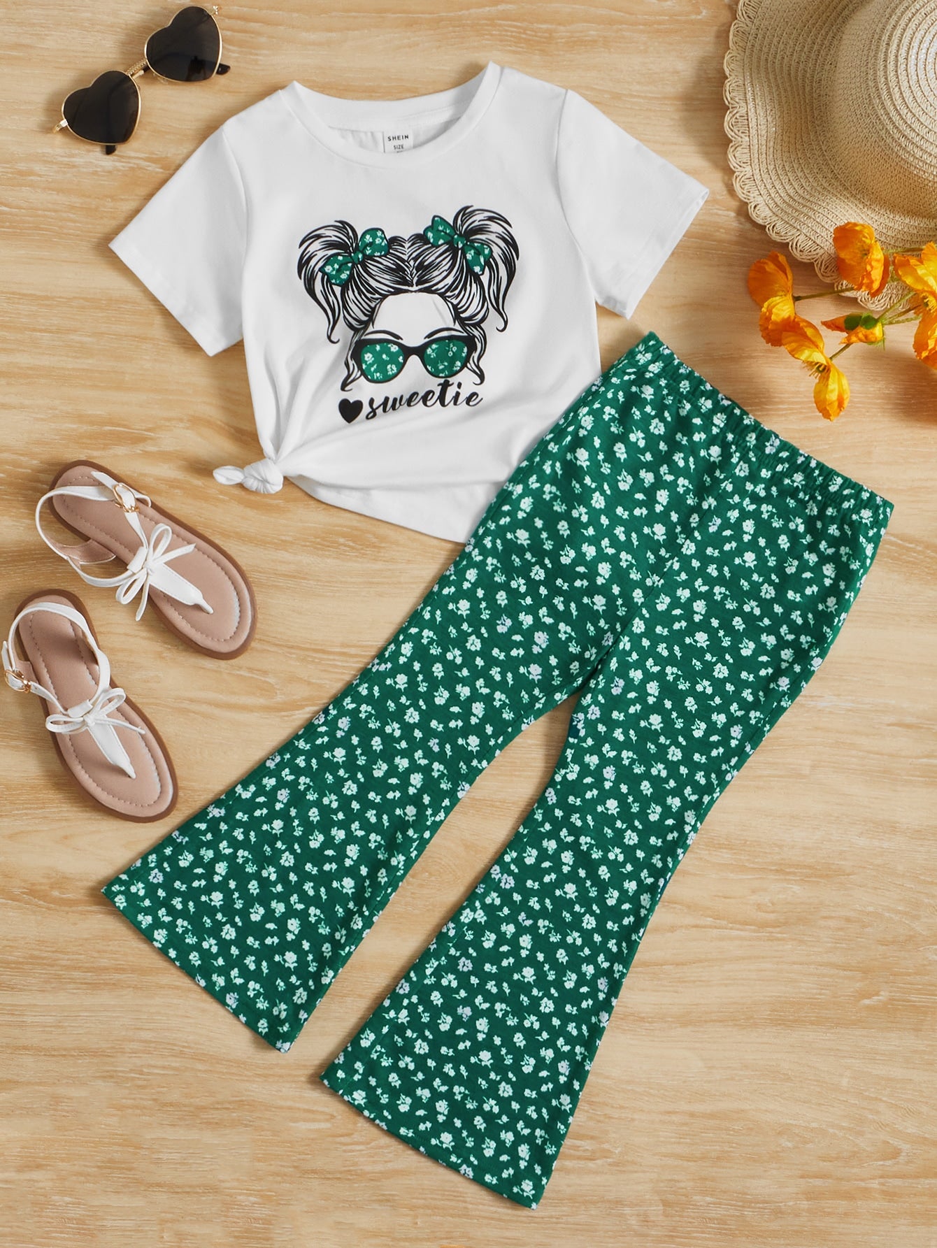 Young Girl Figure Graphic Tee & Ditsy Floral Flare Leg Pants