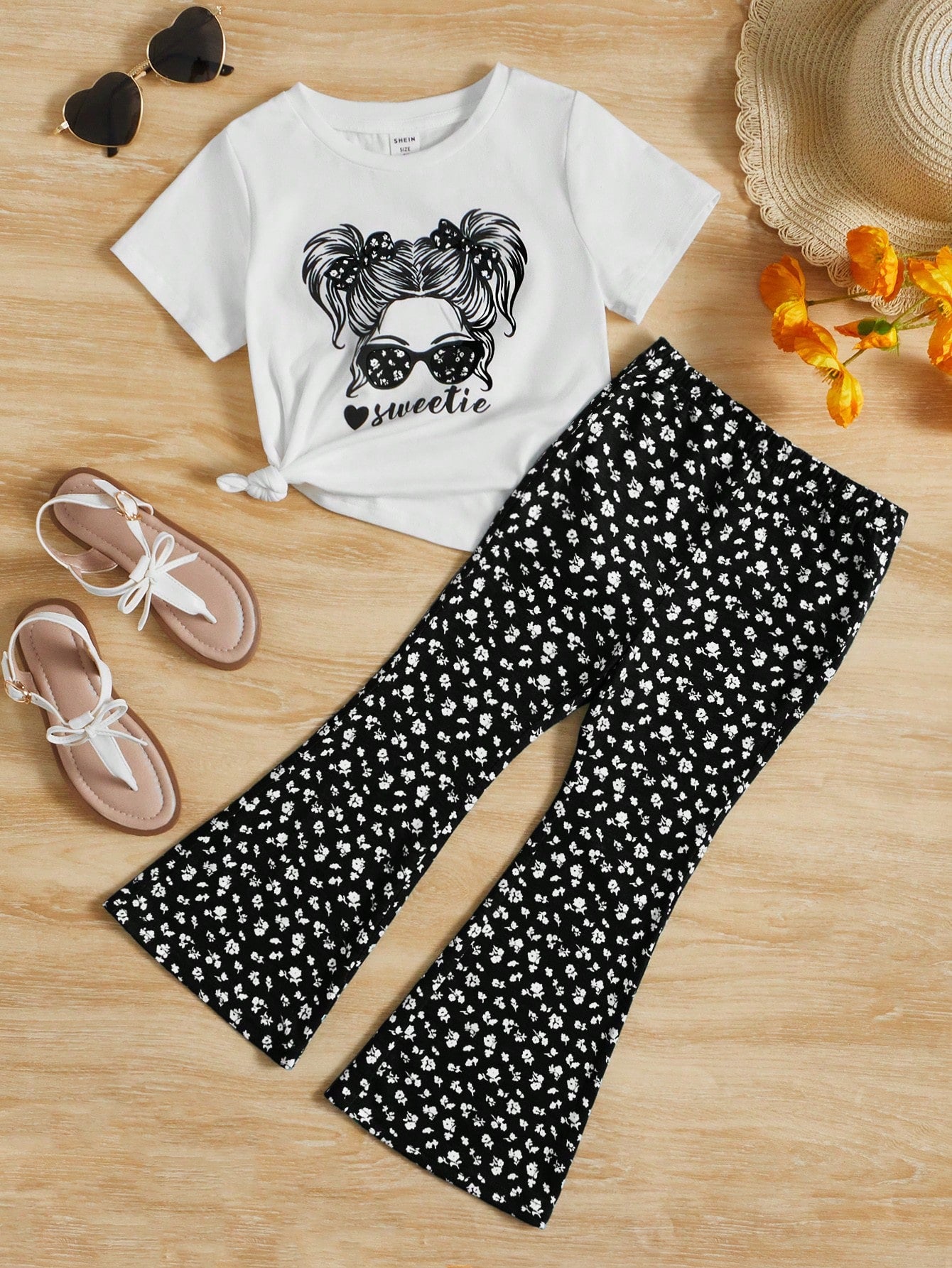 Young Girl Figure Graphic Tee & Ditsy Floral Flare Leg Pants